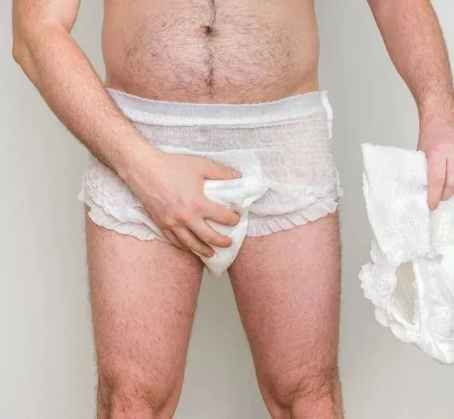 Using requisites such as nappies during adult play